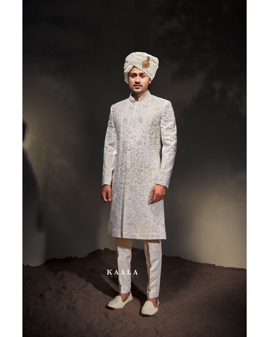 White floral embroidery shervani for groom.
